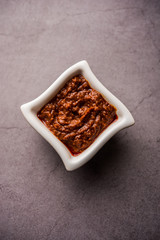 Homemade Tandoori Paste or Marinade mixture, in a bowl. used for grilled chicken or Paneer or vegetable. selective focus