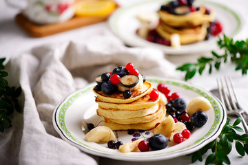 Gluten free pancakes with mixed berry.style vintage