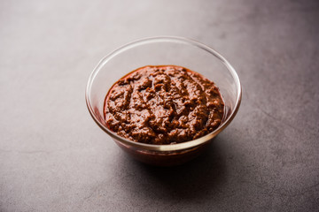 Homemade Tandoori Paste or Marinade mixture, in a bowl. used for grilled chicken or Paneer or vegetable. selective focus
