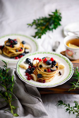 Gluten free pancakes with mixed berry.style vintage