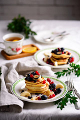 Gluten free pancakes with mixed berry.style vintage