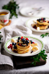 Gluten free pancakes with mixed berry.style vintage