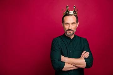 Photo of arrogant narcistic man with arms crossed looking at you intently not willing to talk with...