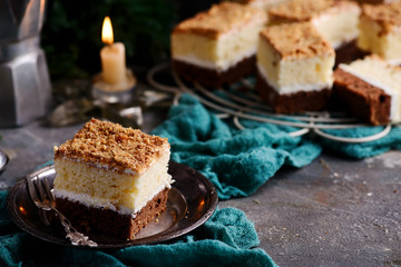Two color chocolate cake on the dark  background.