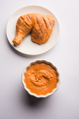 Homemade Tandoori Paste or Marinade mixture, in a bowl. used for grilled chicken or Paneer or vegetable. selective focus