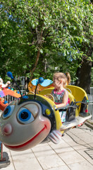 Child rides in an amusement park. children attractions