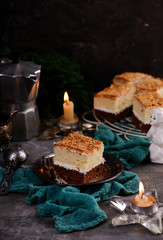 Two color chocolate cake on the dark  background.