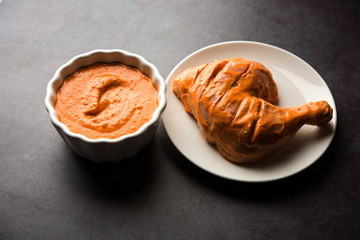 Homemade Tandoori Paste or Marinade mixture, in a bowl. used for grilled chicken or Paneer or vegetable. selective focus
