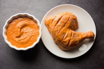 Homemade Tandoori Paste or Marinade mixture, in a bowl. used for grilled chicken or Paneer or vegetable. selective focus