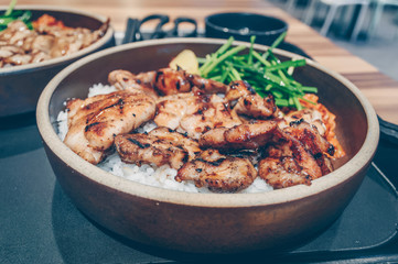fried bbq chicken over rice