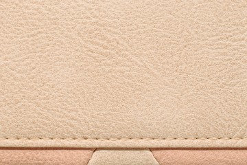 Genuine leather in beige color, leather texture background