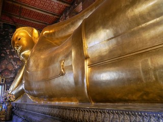sleeping buddha in a temple in Bangkok, thailand