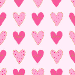 Seamless pattern hearts in rows on a soft pink background.