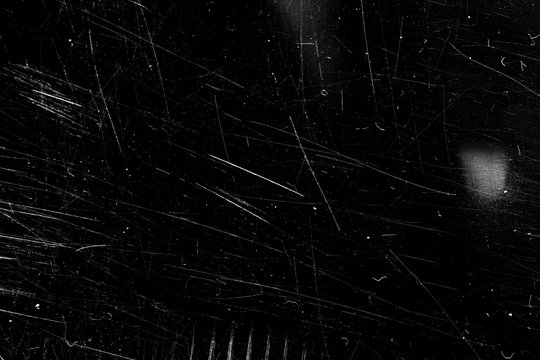 white scratches with scuffs isolated on black