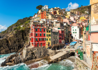 Beautiful view of Riomaggiore - one of five famous colorful villages of Cinque Terre National Park...