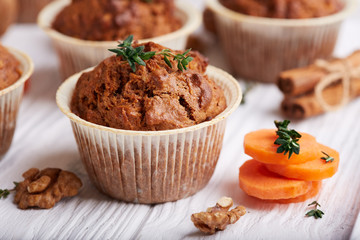 Muffins with carrot, walnuts and cinnamon. Delicious homemade appetizer. 