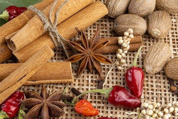 various spices on a background of reed