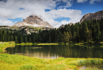 Stunning image of the Antorno lake in National Park Tre Cime di Lavaredo.