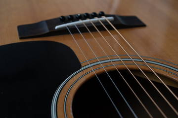 Obraz premium Wood texture of lower deck of six strings acoustic guitar