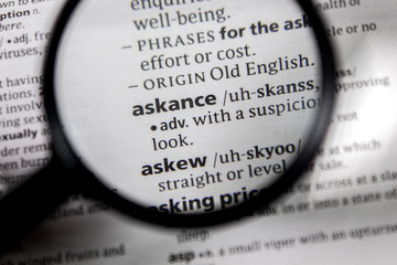 The word or phrase askance in a dictionary.
