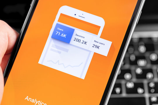 Google Analytics app on the screen smartphone closeup. Google Analytics is a free service provided by Google to create detailed statistics on website visitors. Moscow, Russia - December 12, 2019