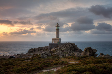 Fototapeta na wymiar Punta Nariga lighthouse at sunset. Malpica de Bergantiños, Galicia, Spain.