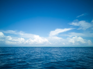 Blue sea under a beutiful sky. Dark blue and turquoise in Semporna Islands, Borneo, Sabah.