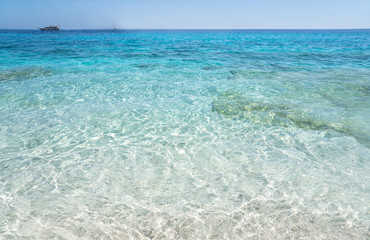Obraz na płótnie Canvas Clear azure coloured sea water, Sardinia, Italy