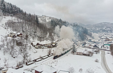 Fototapeta premium Winter Steam Train Narrow Gauge Mocanita Romania