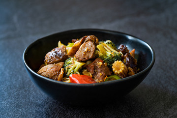 Duck Breast Fillets Steak with orange Halves and Vegetables.