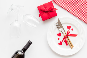 Valentines day table. Plate on white background top-down