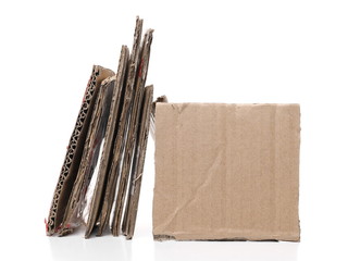 Cardboard pieces pile for recycling isolated on white background