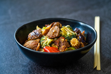 Duck Breast Fillets Steak with orange Halves and Vegetables.