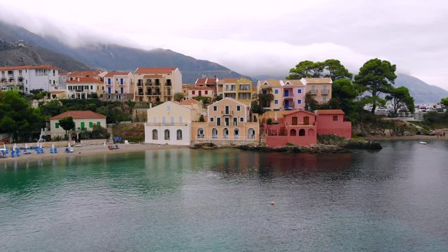 Colorful houses on the bay in Asos. Greece. Aerial view.