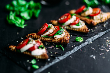 Bruschetta with caprese salad. Italian cuisine
