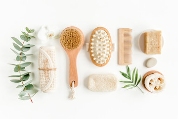 Spa Background. Natural/Organic spa cosmetics products, eco friendly bathroom accessories, palm leaves. Skincare concept on white background. Flat lay, top view