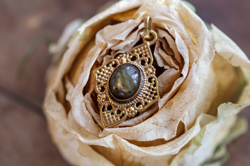 Brass oriental style pendant with labradorite mineral stone