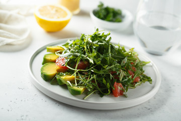 Arugula salad with grapefruit and avocado
