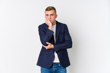 Young business caucasian man who is bored, fatigued and need a relax day.