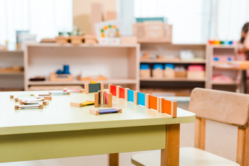 Selective focus of educational game on table in montessori school