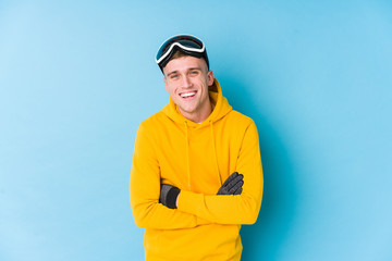 Young skier man laughing and having fun.
