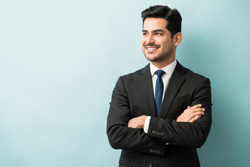 Confident Male Professional Smiling In Studio