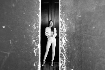 Black-white photo of a girl in the studio