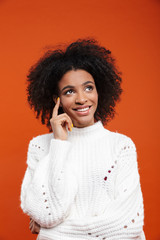 Beautiful young african woman wearing sweater