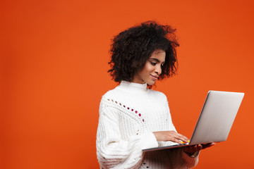 Attractive young african woman standing