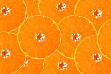 Thin slice of orange, stacked as a backdrop.