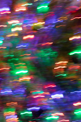 Festive rainbow colored blurred background spin