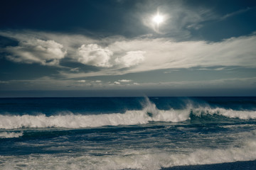 Stormy ocean landscape with rainy clouds