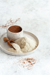 Teff flour and teff grain close up
