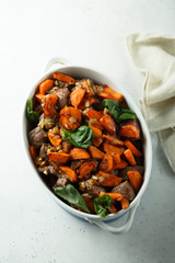 Roasted beef with carrot and green basil